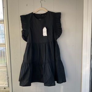 Black ruffle mini dress